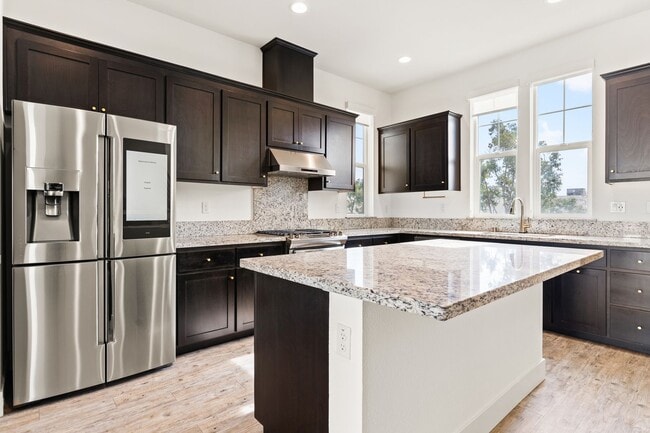 Building Photo - Sun-Filled Corner 4BR w/ Dual Yards & Panoramic Indoor-Outdoor Flow