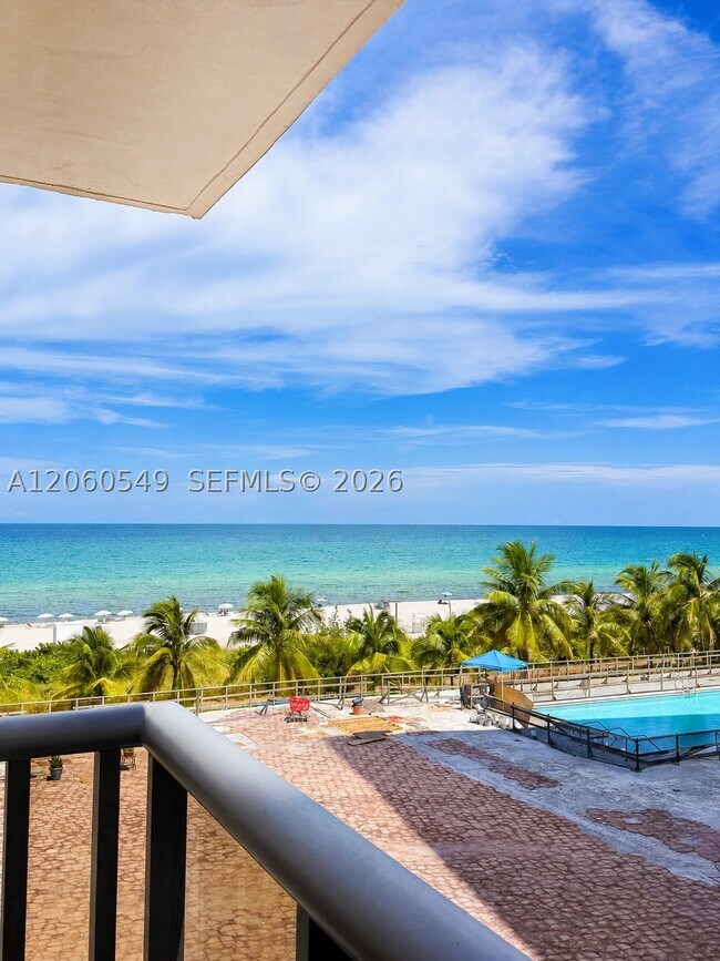 Building Photo - 6039 Collins Ave