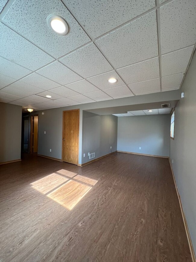 Building Photo - NE House for Rent 4 bedroom 2 full bathroom fenced in yard 2 Car attached garage.