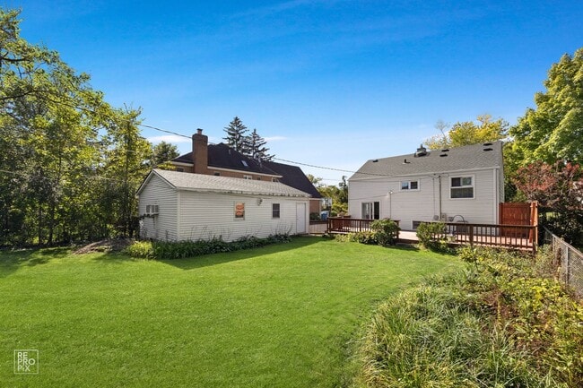 Building Photo - Elmhurst Three Bedroom Home with Fenced Yard and Detached Garage