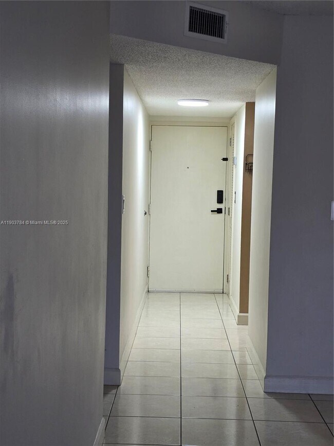 Building Photo - 9917 W Okeechobee Rd