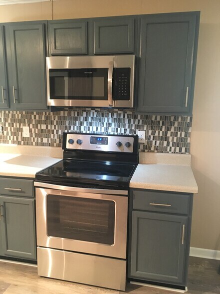 All new stainless/black appliances including microwave range hood. - 510 Short St