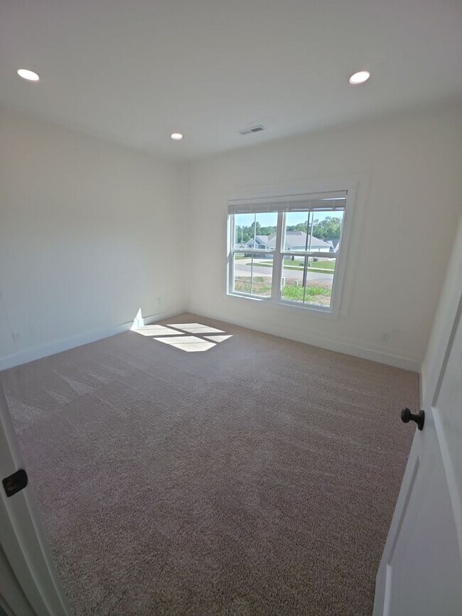 Building Photo - Brand-New 3-Bedroom Single-Level Home with 2-Car Garage and Maintenance-Free Living