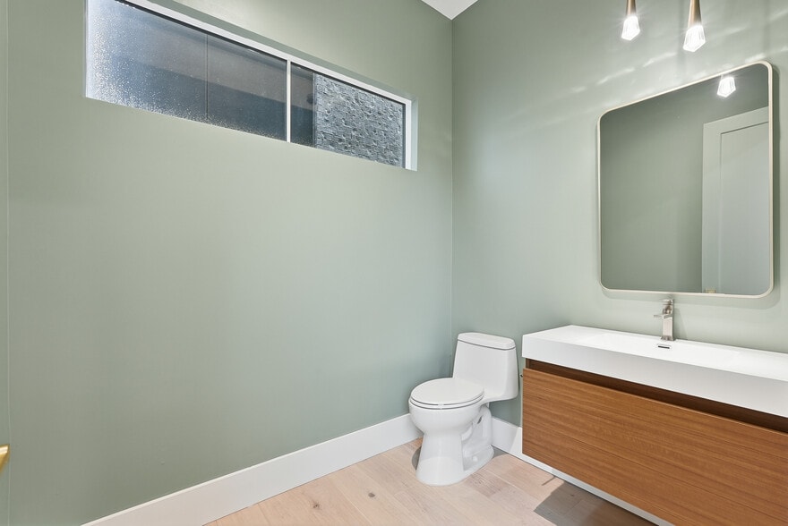 Modern bathroom featuring clean finishes, sleek fixtures, and a bright, refreshed feel - 3718 West End Ave