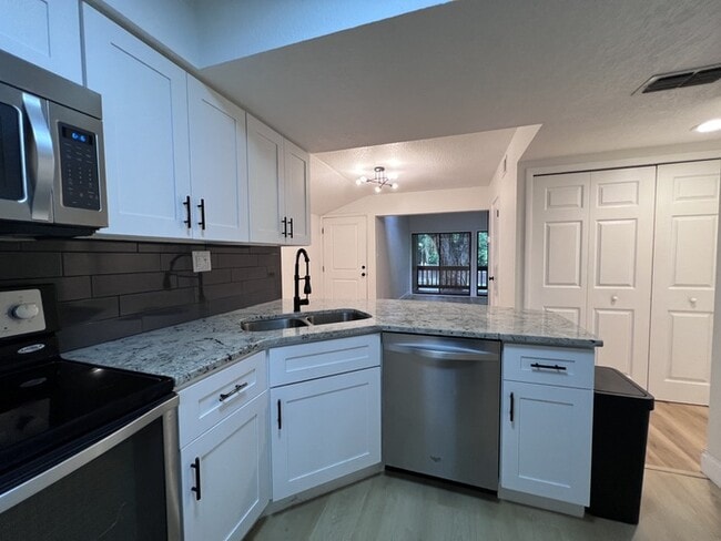 Building Photo - Desirable Sodo District, this spacious 2 b...