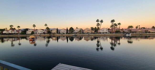 Building Photo - LAKEFRONT - 2 STORY SPACIOUS 4 BEDROOM HOU...