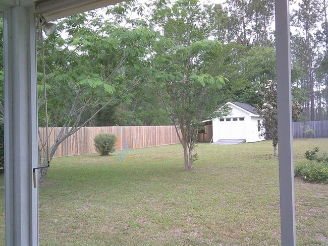 Building Photo - Spacious 3BR Home with Screened Porch, Fenced Backyard & Wired Shop in North Valdosta