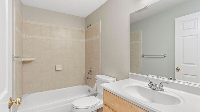Building Photo - This ground floor corner-unit condo
