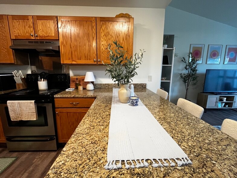 Gourmet granite breakfast bar - 2121 S. Main St