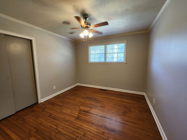 Building Photo - Charming 3BR/2BA Brick Home with Vintage Flair, Expansive Backyard & Walk to VSU!