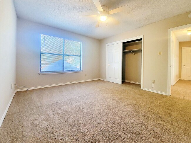 Building Photo - Warm & Inviting 4BR / 2.5BA Home with Covered Deck and 2-Car Garage