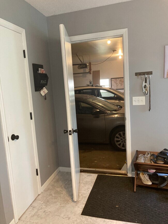 Garage entry from dining area - 620 114th Ln NE