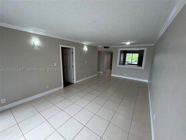 Building Photo - 8560 N Sherman Cir