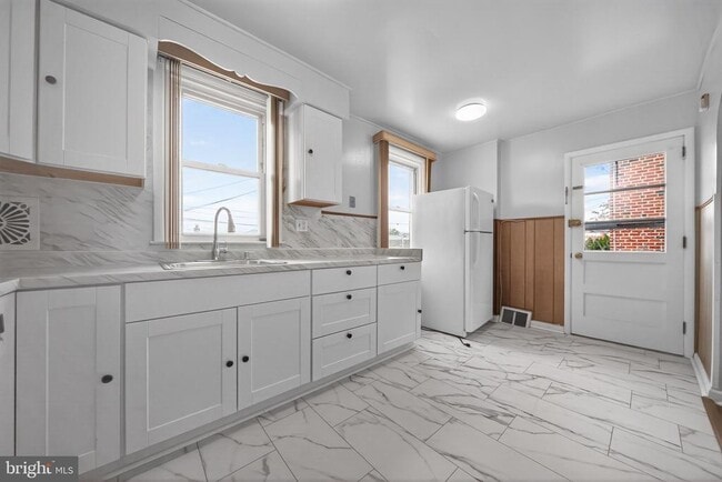 Building Photo - 9050 Convent Ave