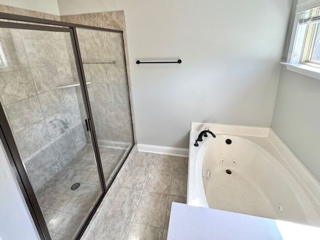 Building Photo - OPEN HOUSE! Now Leasing A Spacious 4 Bedro...