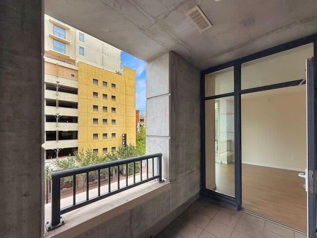 Building Photo - Newly Remodeled 2B/2BA condo w/ Reserved P...