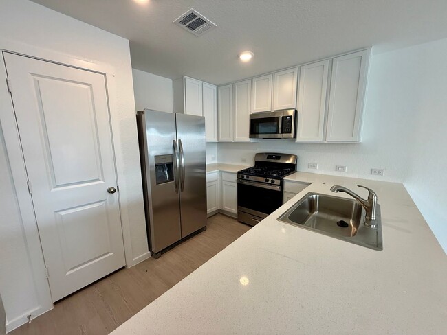Building Photo - Brand NEW 4-bedroom, 2-bathroom home for l...