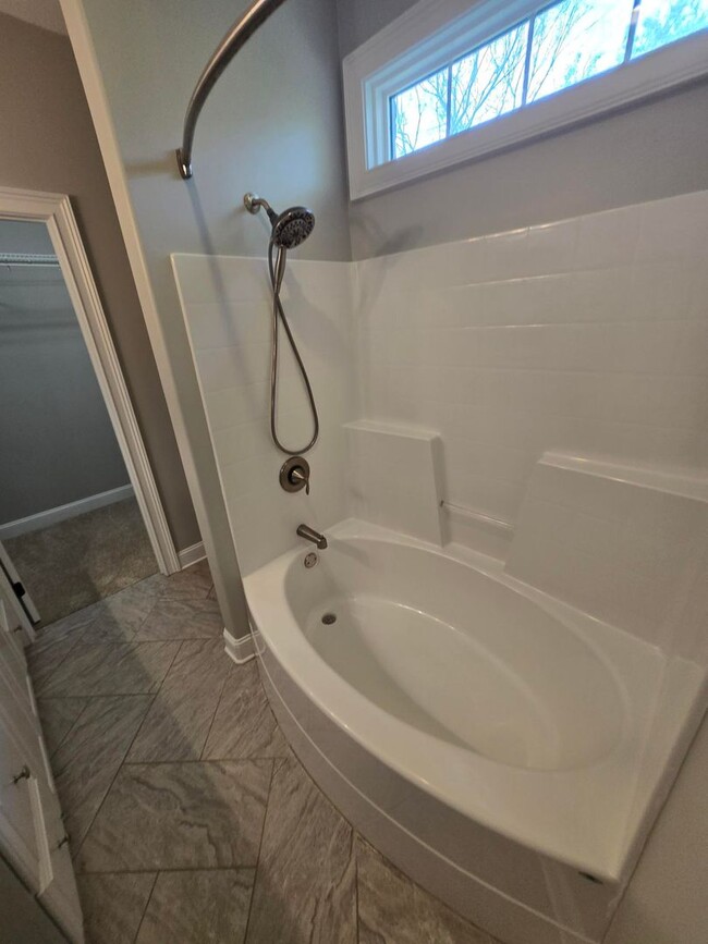 Building Photo - Luxury 4-Bedroom Home with Outdoor Oasis i...