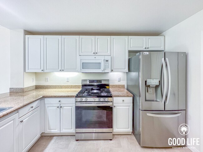 Building Photo - OC: Spacious 2BD/2.5BA Condo in Irvine with Resort-Style Amenities, Private Balcony & In-Unit Lau...
