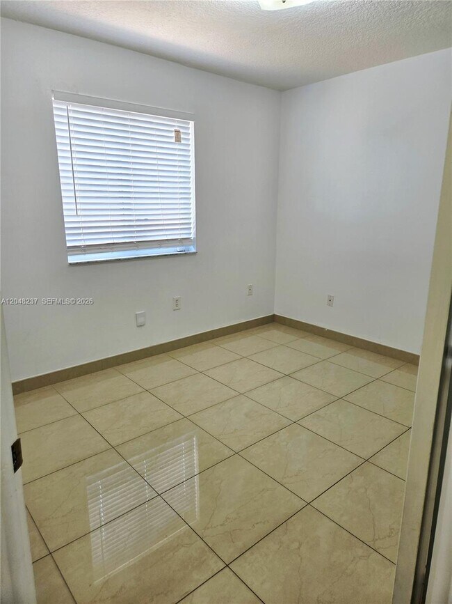 Building Photo - 7789 W 34th Ln