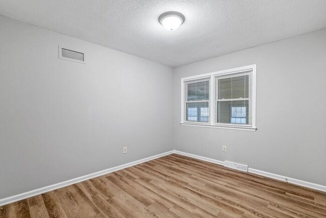 Building Photo - McLeansville - Minutes from Elon & Greensboro! Few Acres, Brick Duplex, Just Painted, New Carpet,...