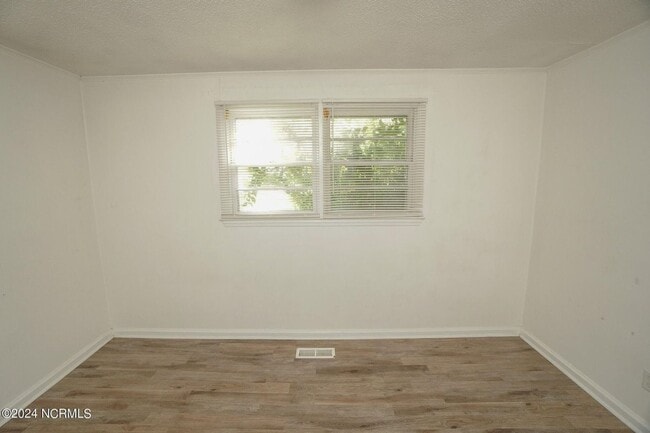 Building Photo - Lawn Care Included in Jville City Limits!