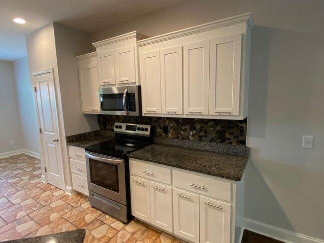 Building Photo - This beautifully 1 small Pet friendly 3 be...