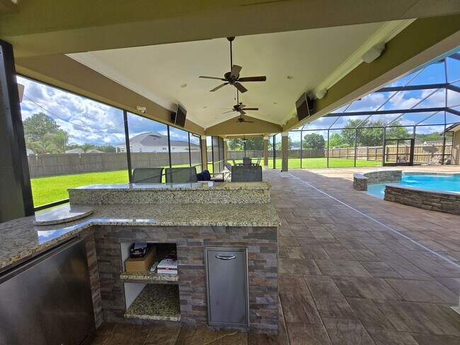 Building Photo - Gorgeous 4-Bedroom Home with Office, Pool,...
