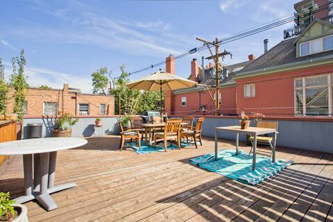 Plenty of pots and a raised garden for those with a green thumb! - 1156 N Logan St