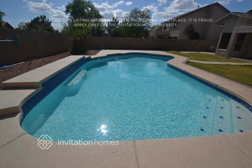 Building Photo - 7447 W Trails Dr