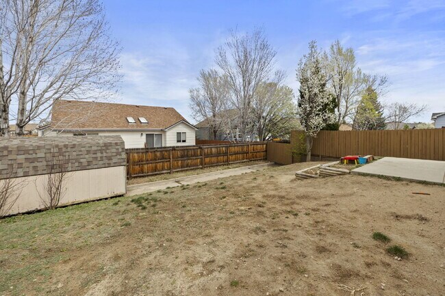 Building Photo - Spacious 4-Bedroom Home with Fenced Yard, 2-Car Garage & Scenic Views in Cheyenne Meadows