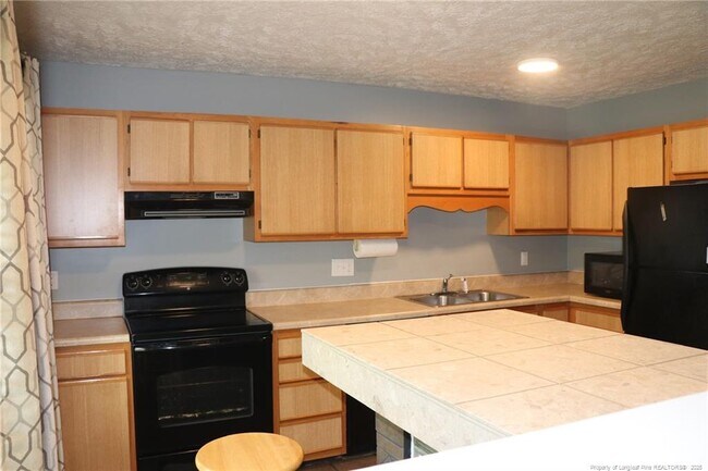 Building Photo - 5681 Pepperbush Dr