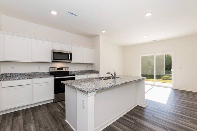 Building Photo - Spacious 4-Bedroom Home with Open Layout