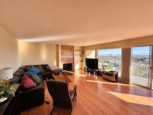 Large living room with a gas fireplace - 2910 S Peck Ave