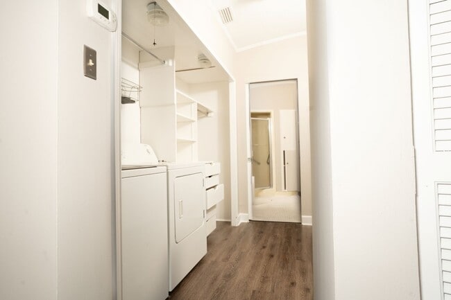 Building Photo - Sprawling 5th-Floor Corner Condo Just Steps from McGee Beach