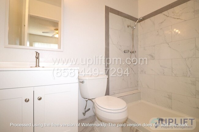 Building Photo - 4 bed, 2 Bath Home With Fenced Yard and attached 2 Car Garage