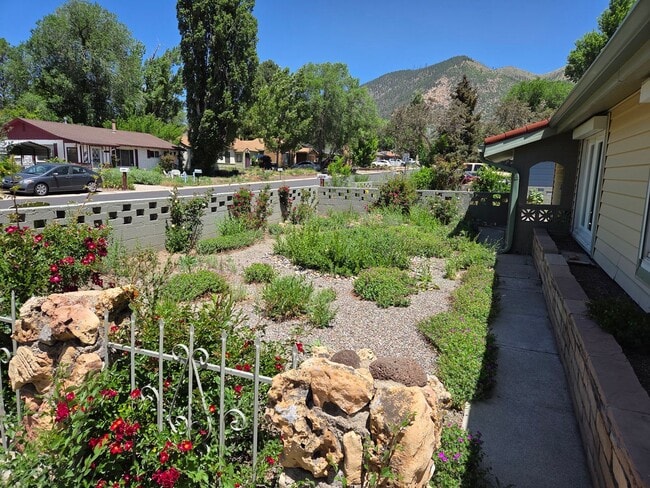 Building Photo - COMING IN JULY! Spacious 4-Bedroom Home in...
