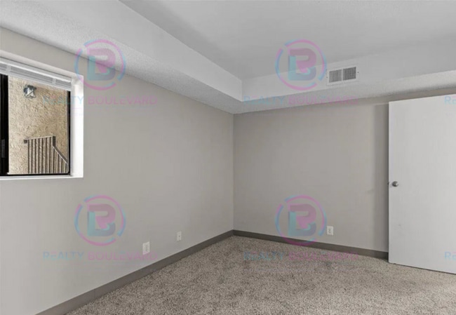 Building Photo - Incredible condo near UNR! This charming 2...