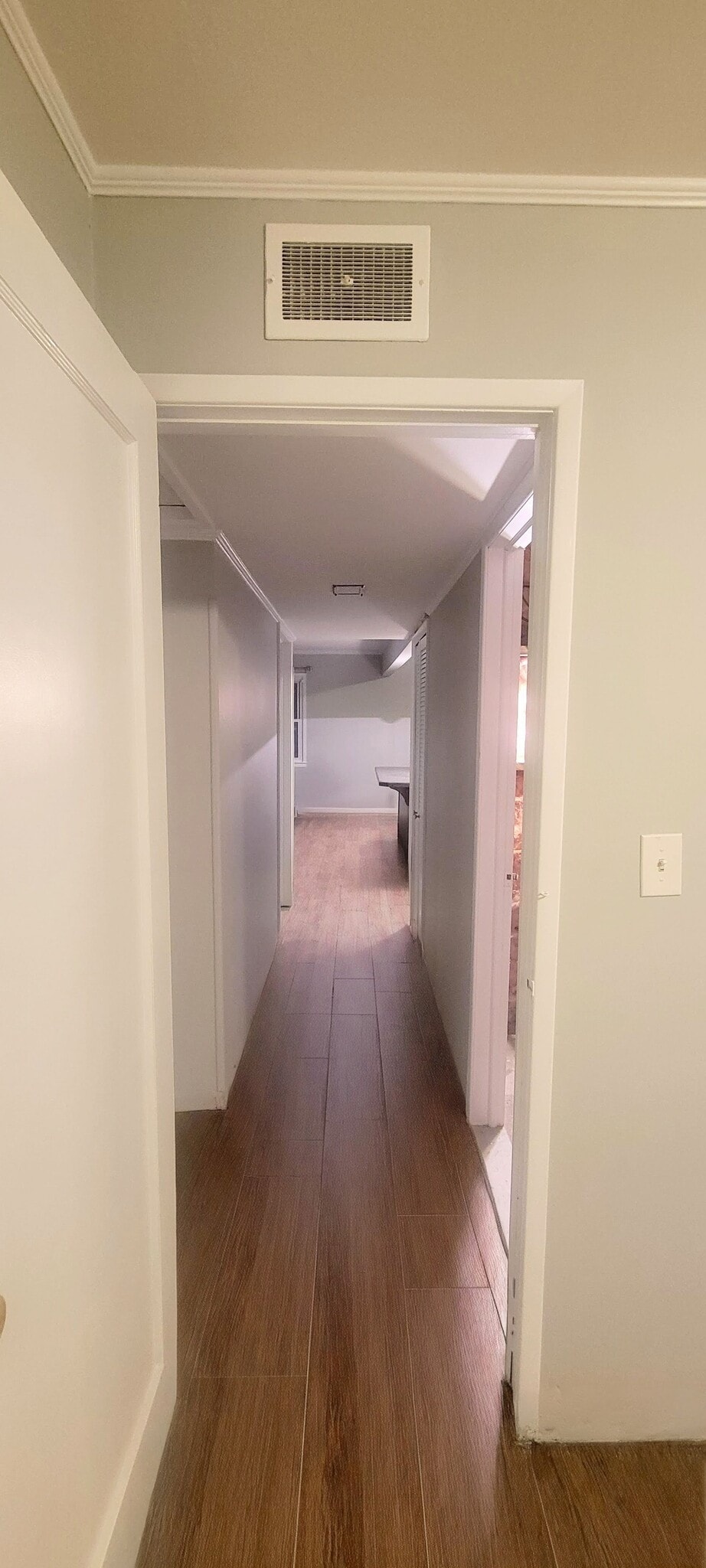 View Down Hallway from Main Bedroom (2nd & 3rd Bedrooms to the left, Bathroom on right) - 411 Brewer St