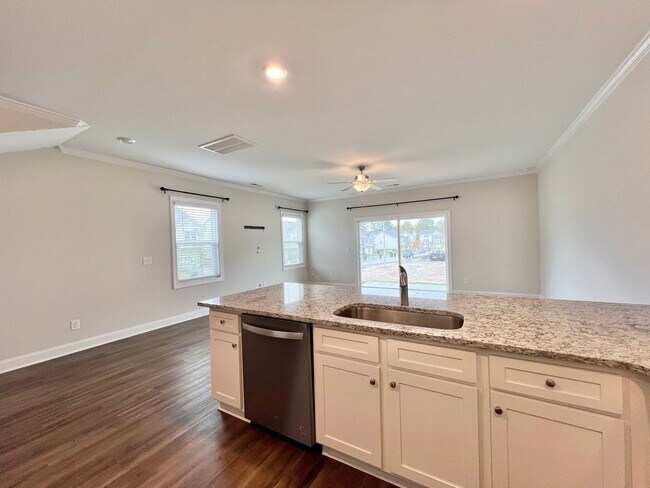 Building Photo - Stunning 3BD, 3BA End Unit Raleigh Townhome on a Corner Lot with High End Features in an HOA Comm...