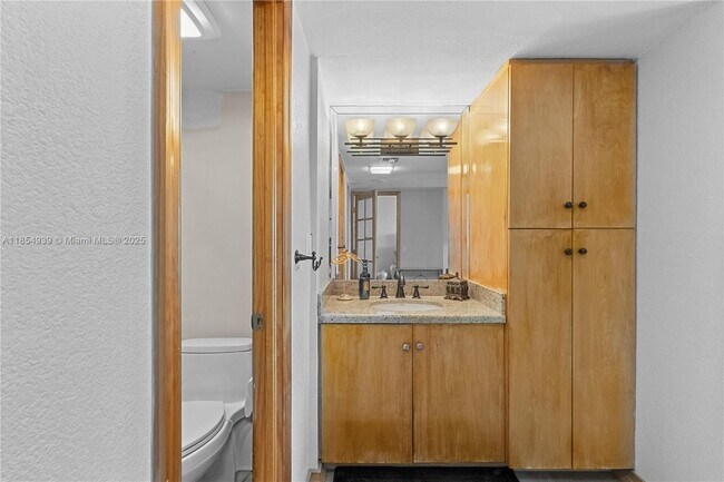 Building Photo - 3675 N Country Club Dr