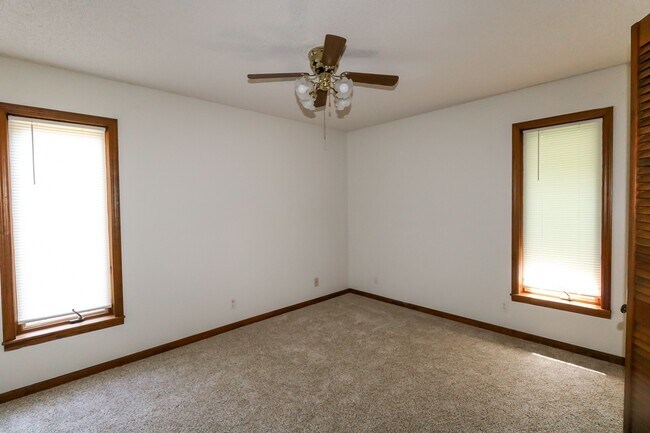 Building Photo - Two Bedroom, 2 Bath, 1-Car Garage, 1179 sq ft feet home with wood burning fireplace. and screened...