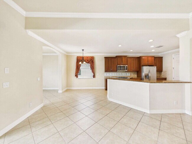 Building Photo - Luxury Lakefront Pool Home in Tesoro - Move-in Ready with Premium Inlcusions