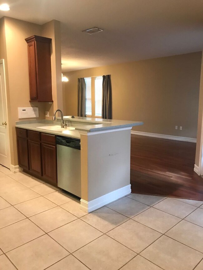 Building Photo - Charming 3/2 home w/ formal office/4th bedroom and fenced yard in Harmony