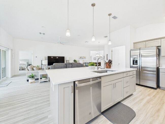 Building Photo - Furnished 3/2 in Water’s Edge | Golf Cart ...