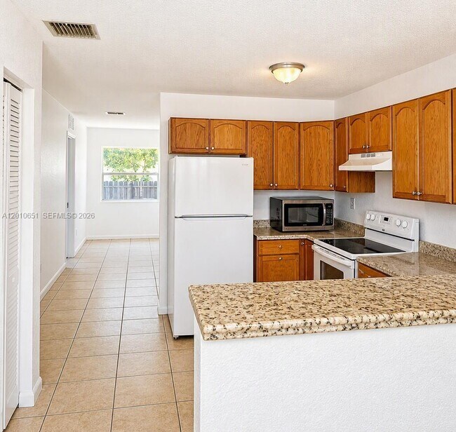 Building Photo - 8180 NW 23rd Ave