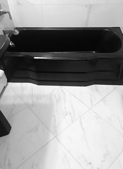 Carrara floor tile matches wall tile - 6012 Donlar St