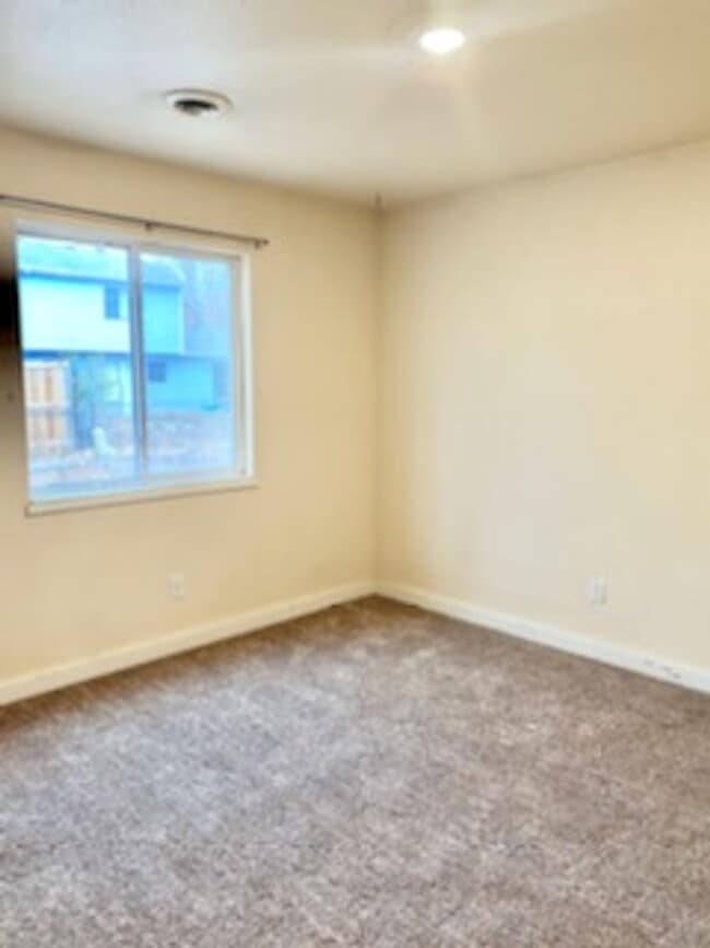 Building Photo - Cozy 2 Bed, 1 Bath, Attached Garage Home on a Large Corner Lot in FOCO