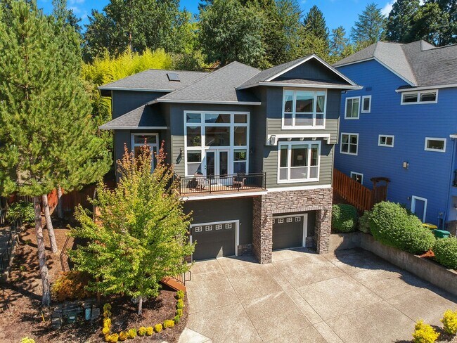 Building Photo - Wonderful, bright 4-bdrm/2.5-bath home. Lovely garden, deck views, great location