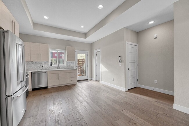 Building Photo - $3,145.95- 3 Bed, 3.5 Bath Townhome in Denver with Central AC and In Unit Laundry